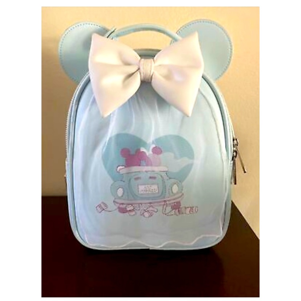 Limited edition Mickey and Minnie Wedding loungefly